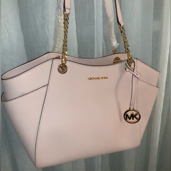 Michael Kors Handbags - NEW Michael Kors Jet Set Purse (with dust bag)